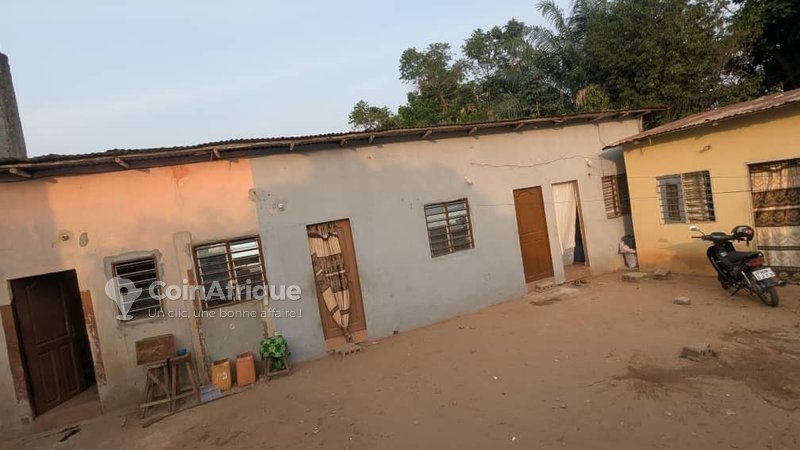 Terrain d'investissement stratégique avec revenus locatifs mensuels