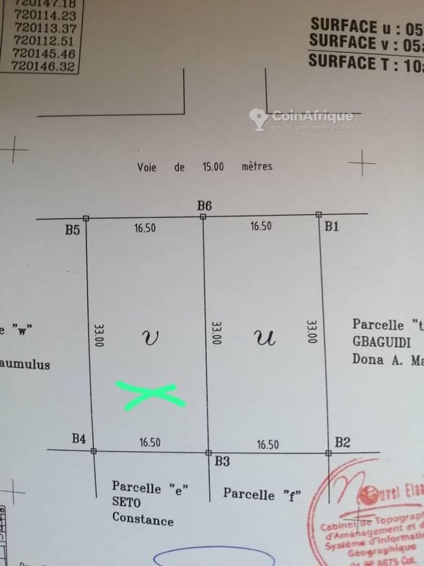 Terrain clôturé avec attestation de recasement et documents certifiés en zone stratégique