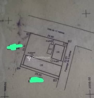 Terrain constructible avec chambres locatives et papiers en règle