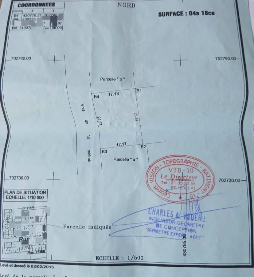 Terrain spacieux de 418 m² avec documents légaux complets - Idéal pour investissement ou construction