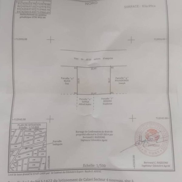 Terrain spacieux de 387m² avec titre foncier et clôture sécurisée