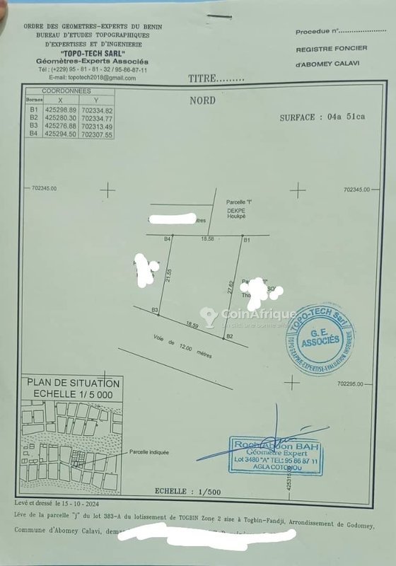 Terrain clôturé de 451 m² en bordure de grande voie pavée à Fidjrossè