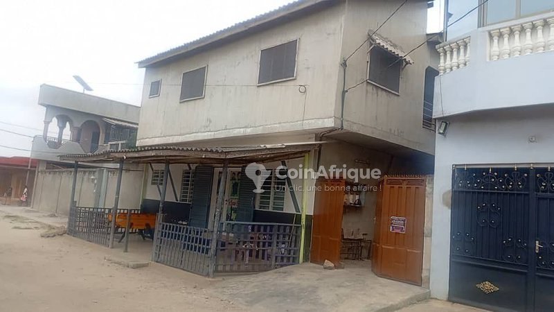 Immeuble locatif R+1 avec 7 pièces et grande boutique en excellent état