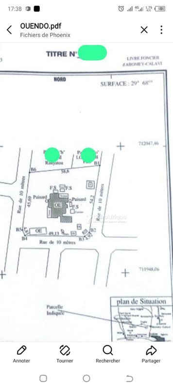 Terrain spacieux de 2968 m² avec titre foncier personnel et bâtiments érigés