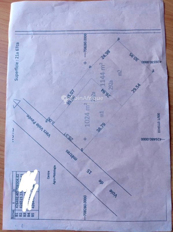 Terrain clôturé de 2156 m² avec titre foncier - Opportunité exceptionnelle