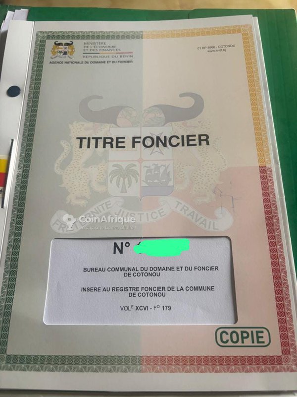 Terrain clôturé de 500 m² avec titre foncier personnel - Idéal pour projets immobiliers