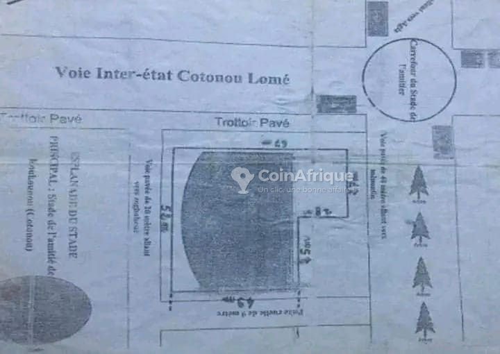 Terrain exceptionnel de 3022 m² avec titre foncier et emplacement commercial stratégique