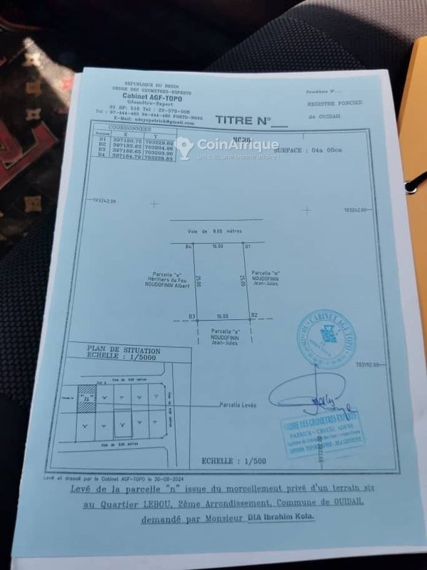 Terrain constructible de 400 m² avec titre foncier global et opportunité d'investissement