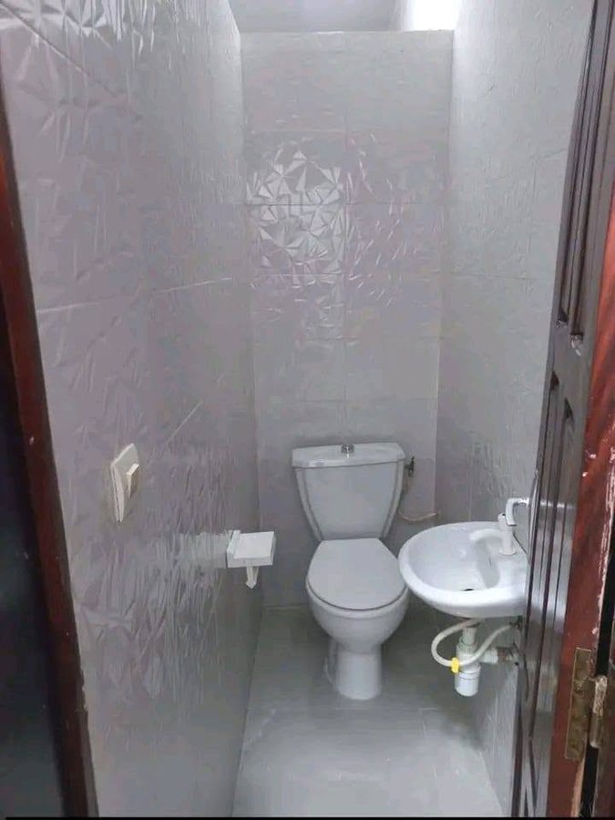 Maison de standing avec 4 chambres et garage double dans un quartier résidentiel calme