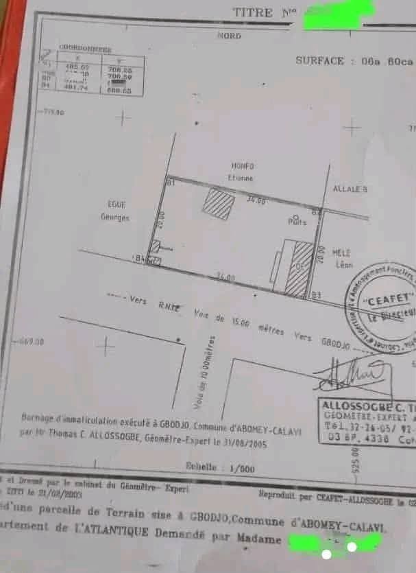 Terrain clôturé de 680m² avec titre foncier - Proche voie goudronnée