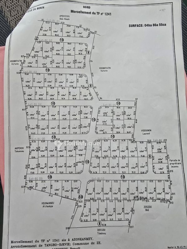 Terrain constructible de 400m² avec titre foncier global dans une zone en développement