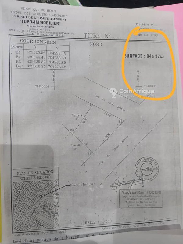 Terrain clôturé de 437 m² avec titre foncier en angle de rue