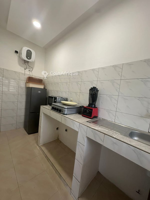 Appartement meublé d'une pièce avec WiFi, eau chaude et cadre calme