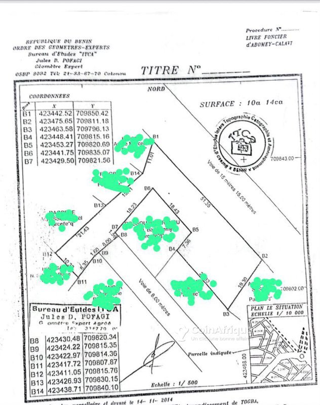 Terrain clôturé de 1014 m² avec titre foncier - Idéal pour construction résidentielle ou commerciale