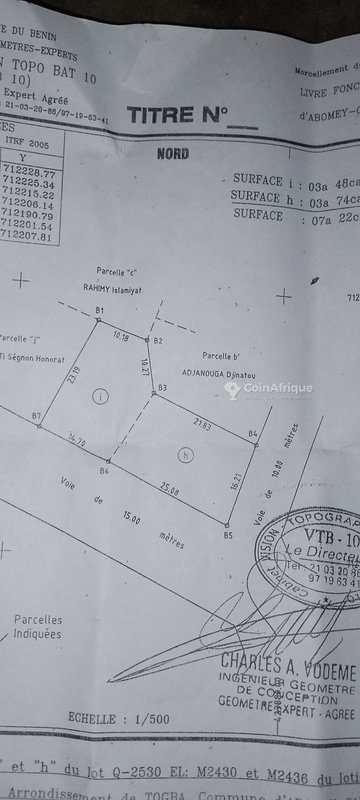 Terrain exceptionnel avec 9 boutiques sanitaires et titre foncier en angle de rue