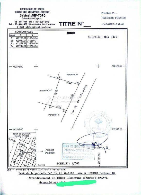 Terrain de 500 m² avec titre foncier, clôture et boutiques inachevées