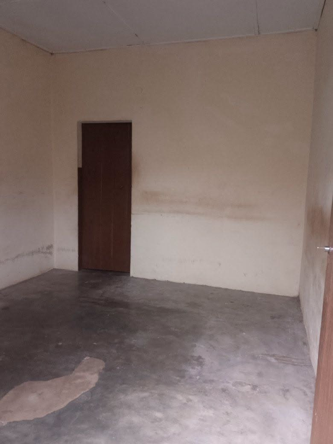 Appartement meublé d'une pièce avec cuisine carrelée et sanitaires sécurisés