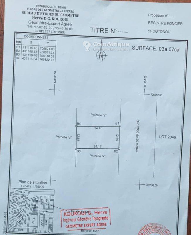 Terrain clôturé de 307 m² en bordure de voie pavée – Idéal pour investissement