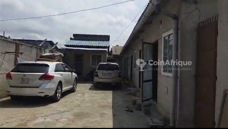 Maison locative de 14 pièces avec titre foncier personnel et grand rendement locatif