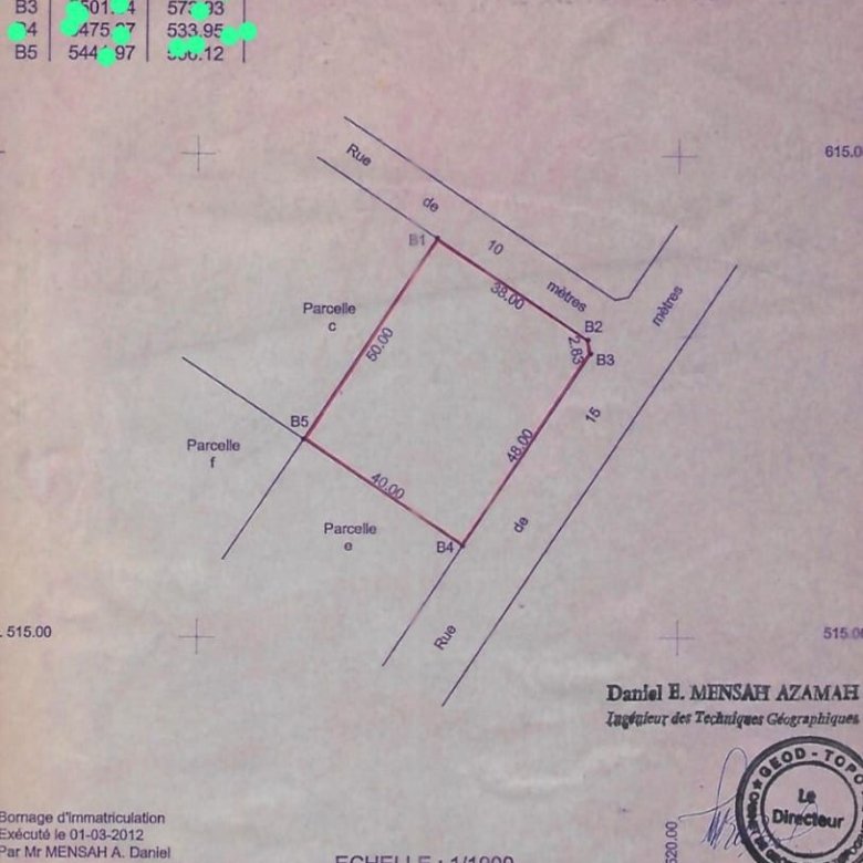 Terrain clôturé de 2000m² avec titre foncier personnel et emplacement stratégique