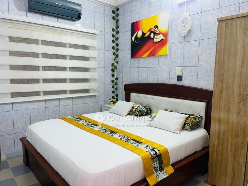 Appartement meublé 2 pièces avec climatisation, garage et équipements haut de gamme